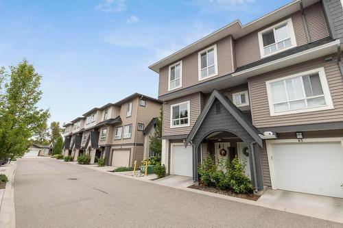 83-680 Old Meadows Road, Kelowna, BC - Outdoor With Facade