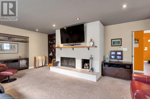 15 Chesham Place, Woodstock, ON - Indoor Photo Showing Living Room With Fireplace