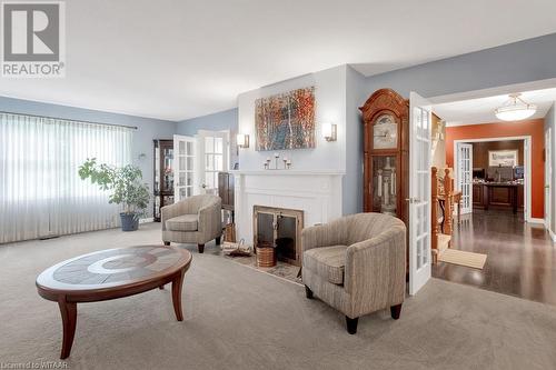 15 Chesham Place, Woodstock, ON - Indoor Photo Showing Living Room With Fireplace