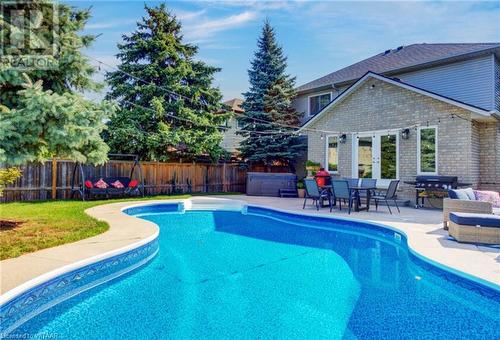 201 Jones Road, Stoney Creek, ON - Outdoor With In Ground Pool With Deck Patio Veranda With Backyard