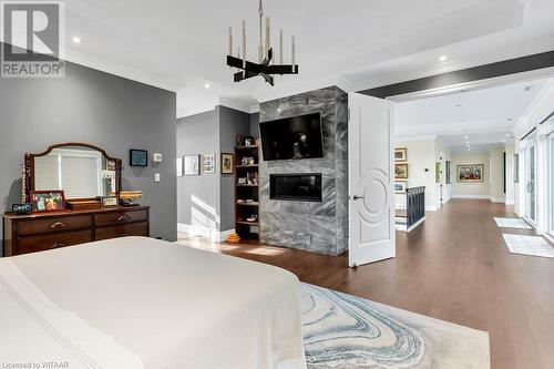 241 Tamarack Boulevard, Woodstock, ON - Indoor Photo Showing Bedroom With Fireplace