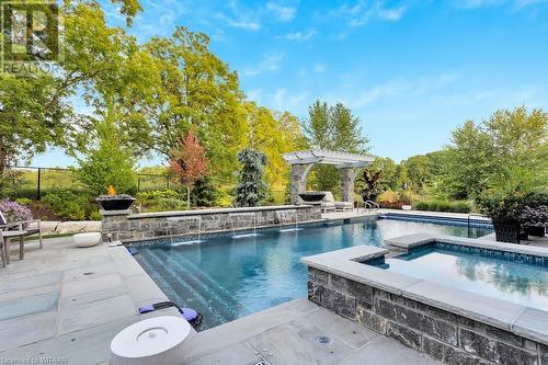 241 Tamarack Boulevard, Woodstock, ON - Outdoor With In Ground Pool With Backyard