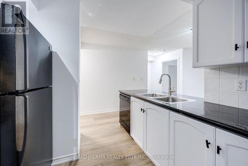 305 - 270 Wellington Street W, Toronto, ON - Indoor Photo Showing Kitchen With Double Sink