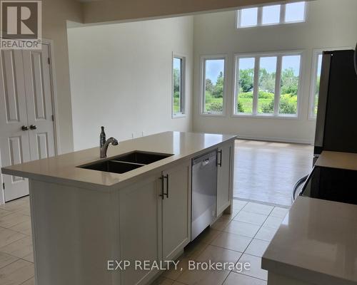 12 Oakmont Drive, Loyalist, ON - Indoor Photo Showing Kitchen With Double Sink