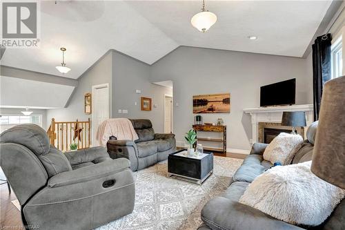 10 Graydon Drive, Mount Elgin, ON - Indoor Photo Showing Living Room With Fireplace