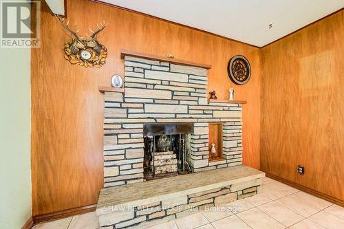 827517 Township Road, Blandford-Blenheim, ON - Indoor Photo Showing Other Room With Fireplace