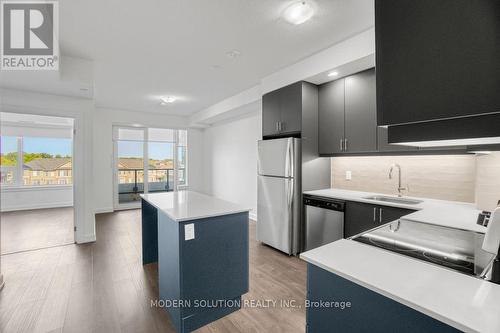 426 - 3200 William Coltson Avenue, Oakville, ON - Indoor Photo Showing Kitchen With Stainless Steel Kitchen