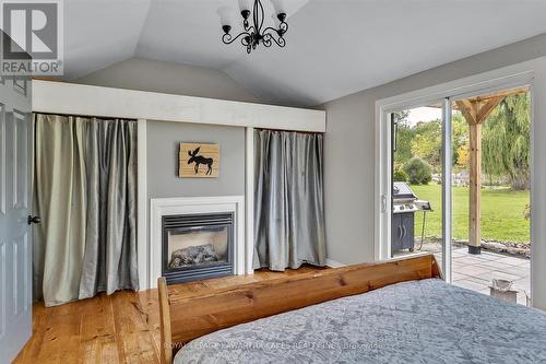 1 Water Street, Kawartha Lakes (Lindsay), ON - Indoor Photo Showing Bedroom With Fireplace