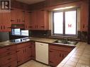 313 21 Highway N, Leader, SK  - Indoor Photo Showing Kitchen With Double Sink 