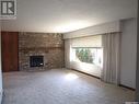 313 21 Highway N, Leader, SK  - Indoor Photo Showing Living Room With Fireplace 