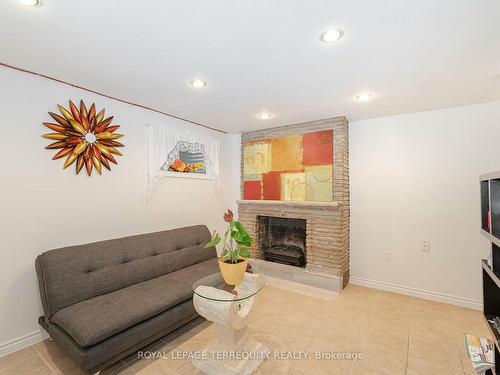 10-2145 Sherobee Rd, Mississauga, ON - Indoor Photo Showing Living Room With Fireplace