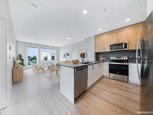 205-6544 Metral Dr, Nanaimo, BC - Indoor Photo Showing Kitchen