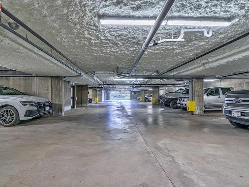 205-6544 Metral Dr, Nanaimo, BC - Indoor Photo Showing Garage