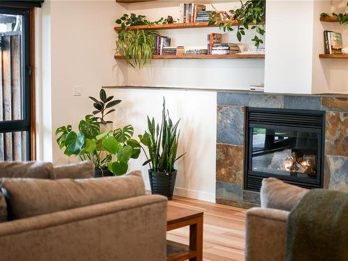 207-554 Marine Dr, Ucluelet, BC - Indoor Photo Showing Living Room With Fireplace