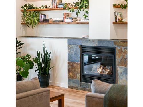 207-554 Marine Dr, Ucluelet, BC - Indoor Photo Showing Living Room With Fireplace