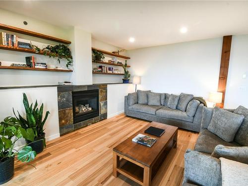 207-554 Marine Dr, Ucluelet, BC - Indoor Photo Showing Living Room With Fireplace