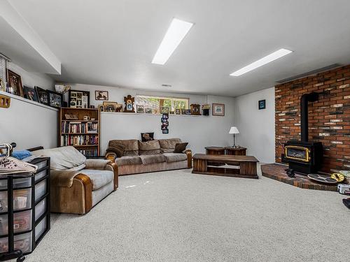 2370 Greenfield Ave, Kamloops, BC - Indoor Photo Showing Basement With Fireplace