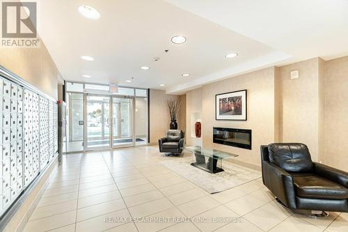 331 - 5317 Upper Middle Road, Burlington, ON - Indoor Photo Showing Other Room With Fireplace