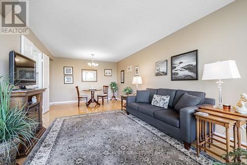 605 - 1111 Bough Beeches Boulevard, Mississauga, ON - Indoor Photo Showing Living Room