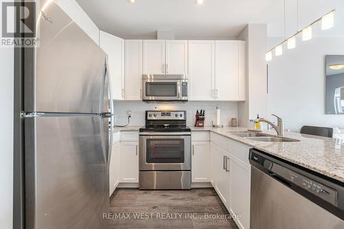 607 - 1 Victoria Street S, Kitchener, ON - Indoor Photo Showing Kitchen With Double Sink