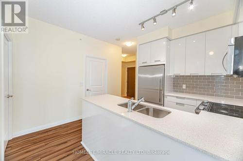 602 - 55 Eglinton Avenue W, Mississauga, ON - Indoor Photo Showing Kitchen With Double Sink