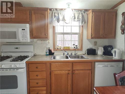 41 Maple Drive, Miller Lake, ON - Indoor Photo Showing Kitchen With Double Sink