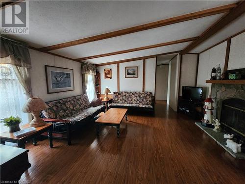 41 Maple Drive, Miller Lake, ON - Indoor Photo Showing Living Room With Fireplace