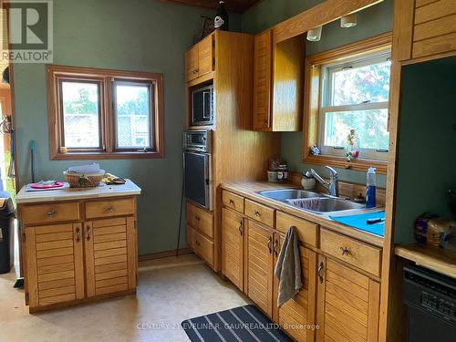 205 Birch Street, Temiskaming Shores, ON - Indoor Photo Showing Kitchen With Double Sink