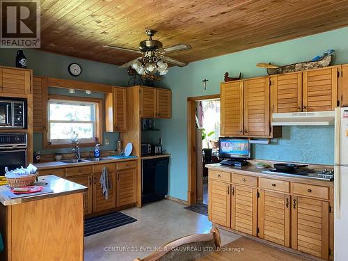 205 Birch Street, Temiskaming Shores, ON - Indoor Photo Showing Kitchen With Double Sink