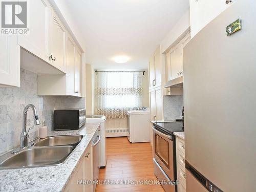 906 - 1615 Bloor Street, Mississauga, ON - Indoor Photo Showing Kitchen With Double Sink