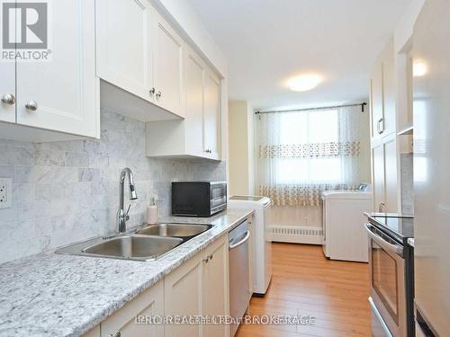 906 - 1615 Bloor Street, Mississauga, ON - Indoor Photo Showing Kitchen With Double Sink