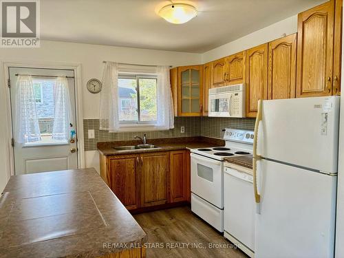 3 Caroline Street, Kawartha Lakes, ON - Indoor Photo Showing Kitchen With Double Sink