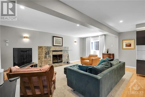 519 Penhill Avenue, Ottawa, ON - Indoor Photo Showing Living Room With Fireplace