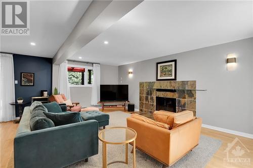 519 Penhill Avenue, Ottawa, ON - Indoor Photo Showing Living Room With Fireplace