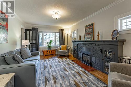 166 Thornton Avenue, London, ON - Indoor Photo Showing Living Room With Fireplace