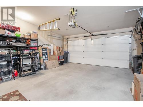 1836 Tower Ranch Boulevard Unit# 1, Kelowna, BC - Indoor Photo Showing Garage