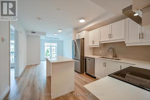 310 - 153 Wilson Street W, Hamilton, ON - Indoor Photo Showing Kitchen With Double Sink