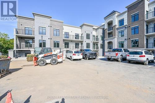 310 - 153 Wilson Street W, Hamilton, ON - Outdoor With Balcony With Facade