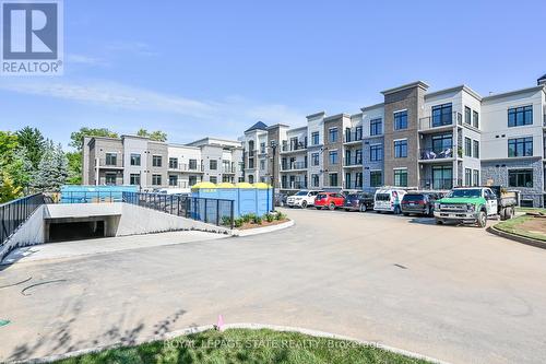 310 - 153 Wilson Street W, Hamilton, ON - Outdoor With Balcony With Facade