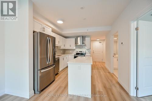 310 - 153 Wilson Street W, Hamilton, ON - Indoor Photo Showing Kitchen