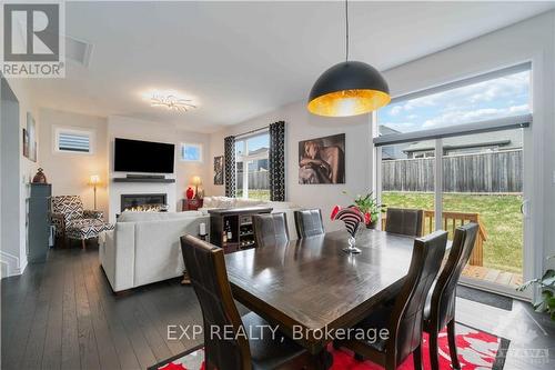 604 Enclave Lane, Clarence-Rockland, ON - Indoor Photo Showing Dining Room With Fireplace