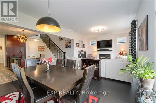 604 Enclave Lane, Clarence-Rockland, ON - Indoor Photo Showing Dining Room With Fireplace