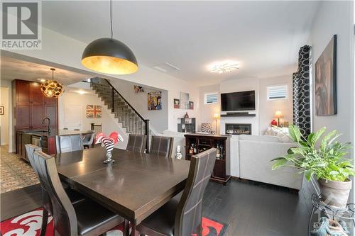 604 Enclave Lane, Clarence-Rockland (606 - Town Of Rockland), ON - Indoor Photo Showing Dining Room With Fireplace