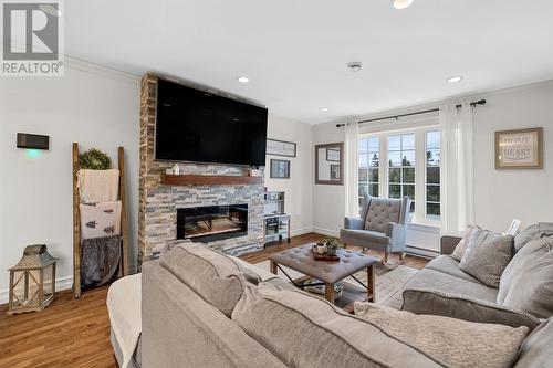 1 Green Hill Drive, Witless Bay, NL - Indoor Photo Showing Living Room With Fireplace