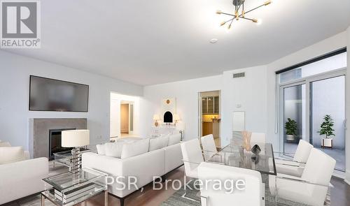 2122 - 20 Blue Jays Way, Toronto, ON - Indoor Photo Showing Living Room With Fireplace