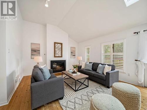 1073 Fern Road, Innisfil, ON - Indoor Photo Showing Living Room With Fireplace