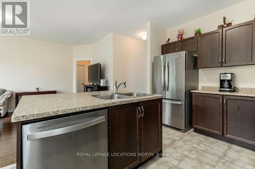 33 Grand Poplar Lane, Wasaga Beach, ON - Indoor Photo Showing Kitchen With Stainless Steel Kitchen With Double Sink