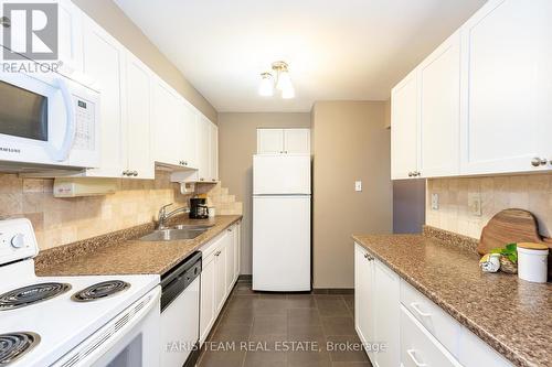 801 - 181 Collier Street, Barrie, ON - Indoor Photo Showing Kitchen With Double Sink