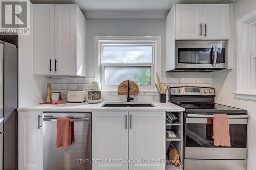 105 Emery Street E, London, ON - Indoor Photo Showing Kitchen With Double Sink