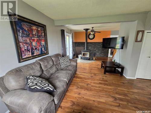 118 Railway Avenue, Windthorst, SK - Indoor Photo Showing Living Room With Fireplace